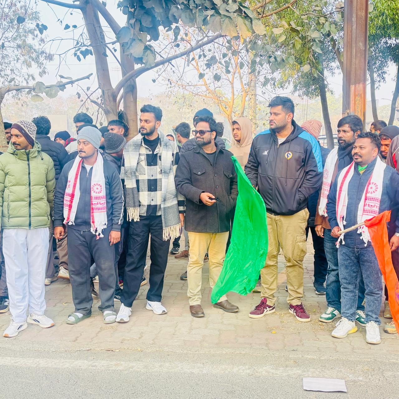 Piyush standing in a group with former Indian cricketer Sourav Tiwari at an outdoor event